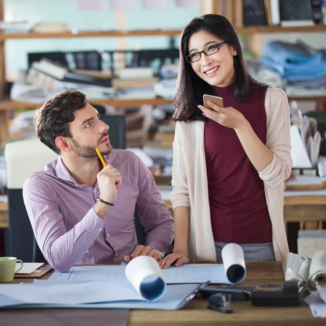 Friends talking in Mandarin at work