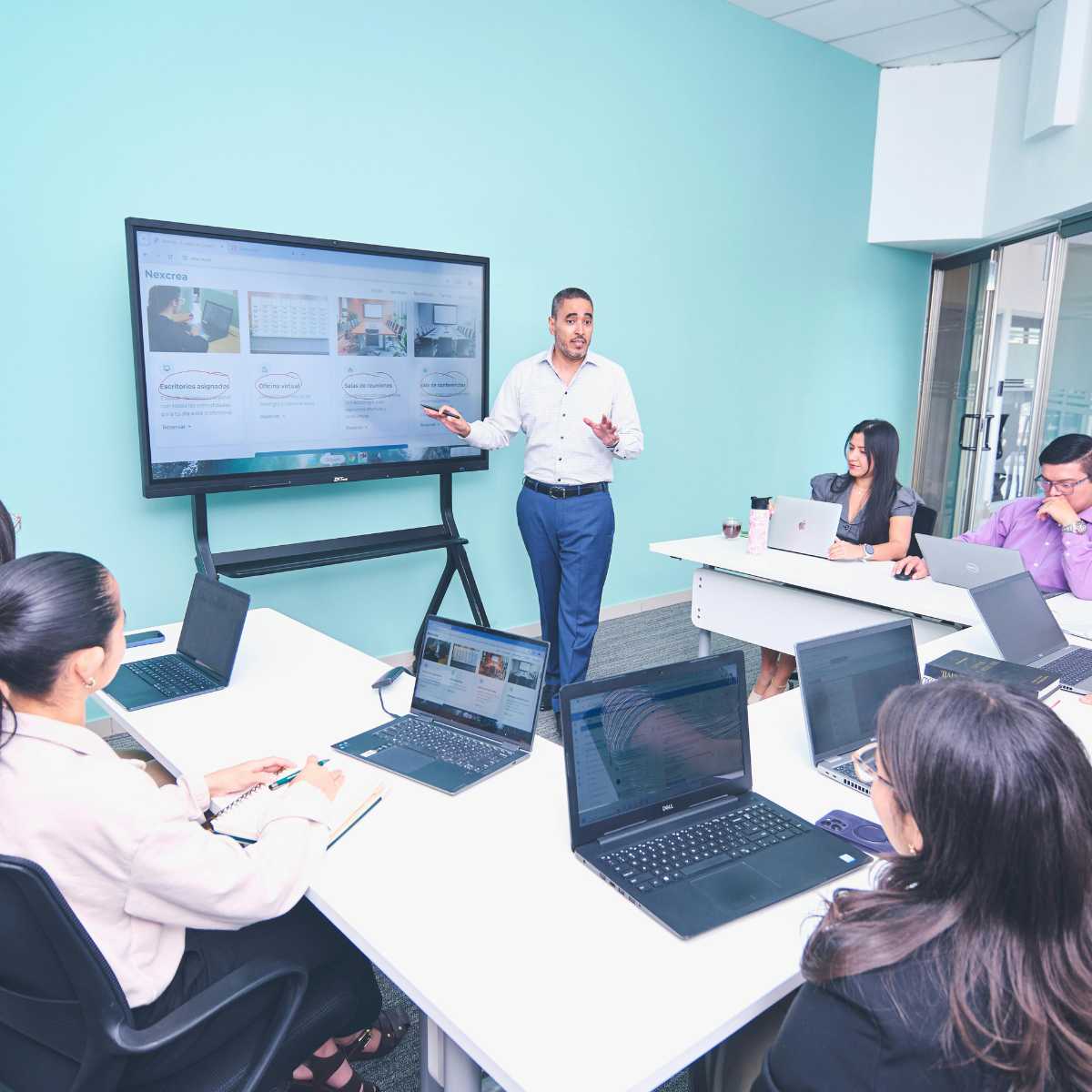 man giving a presentation in English