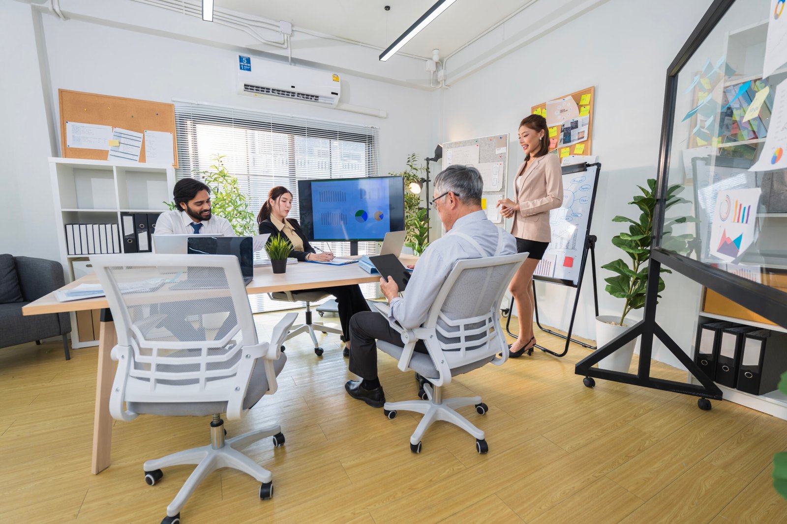 business professionals discussing project in moder 2026 01 11 10 14 26 utc scaled - Lingua Learn Singapore