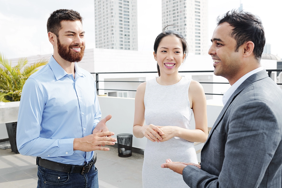 Three people speak Spanish
