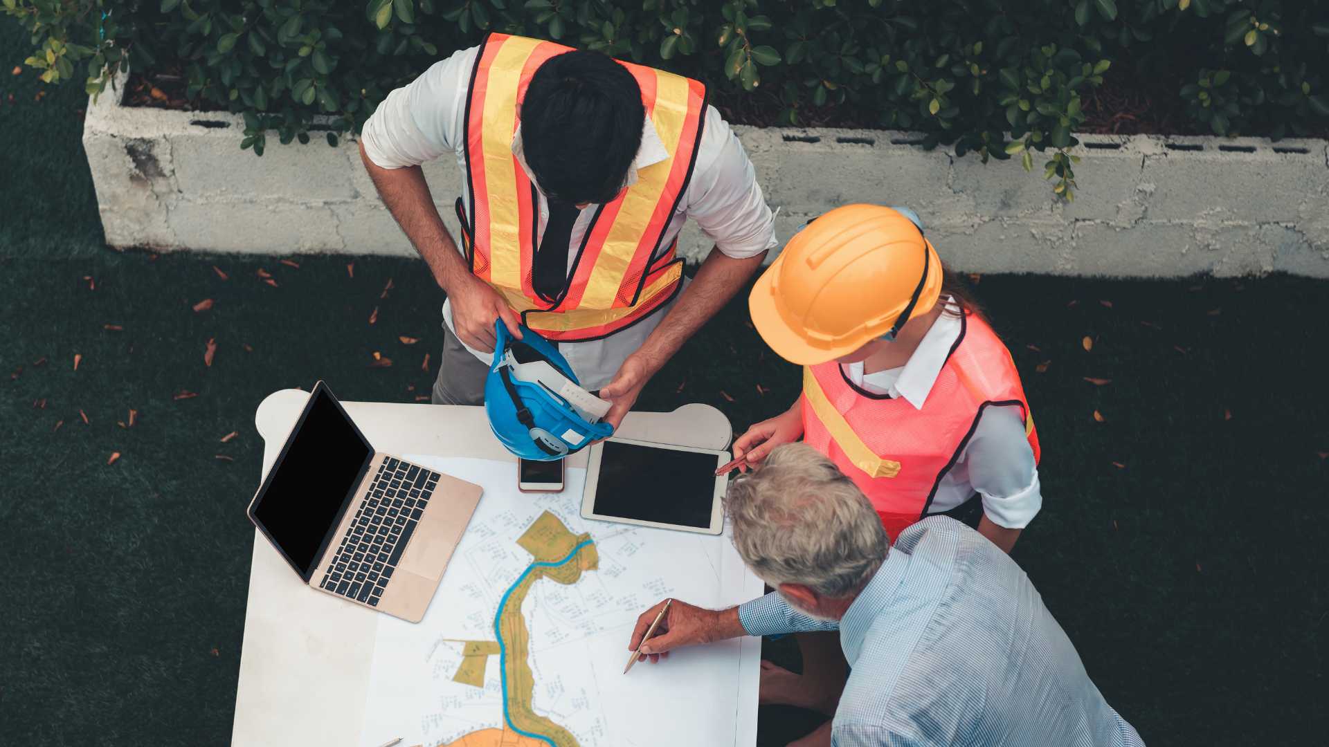 People using English in a project update meeting